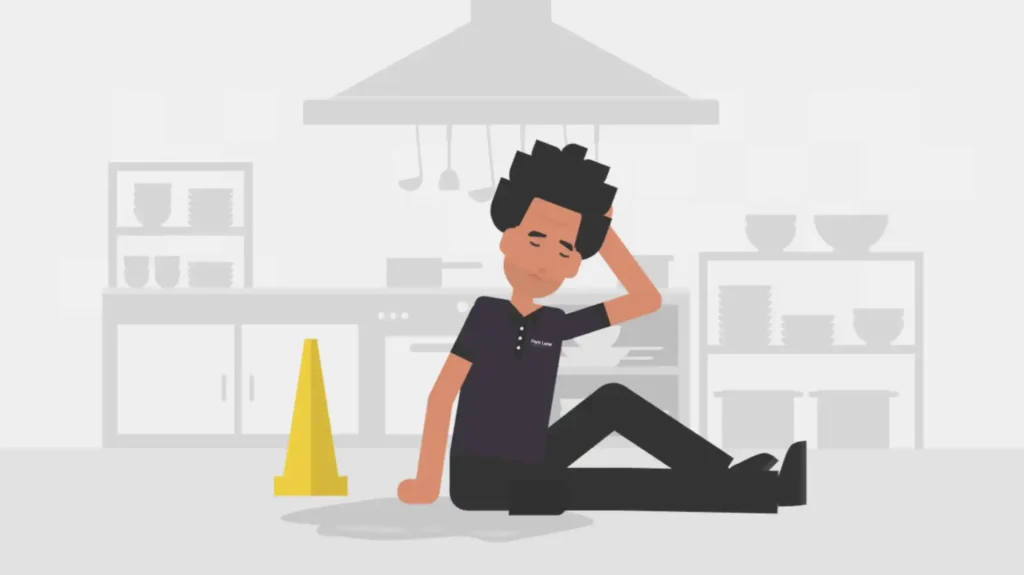 Illustration of a person sitting on the floor of a kitchen, holding their head, next to a yellow caution sign and a puddle.