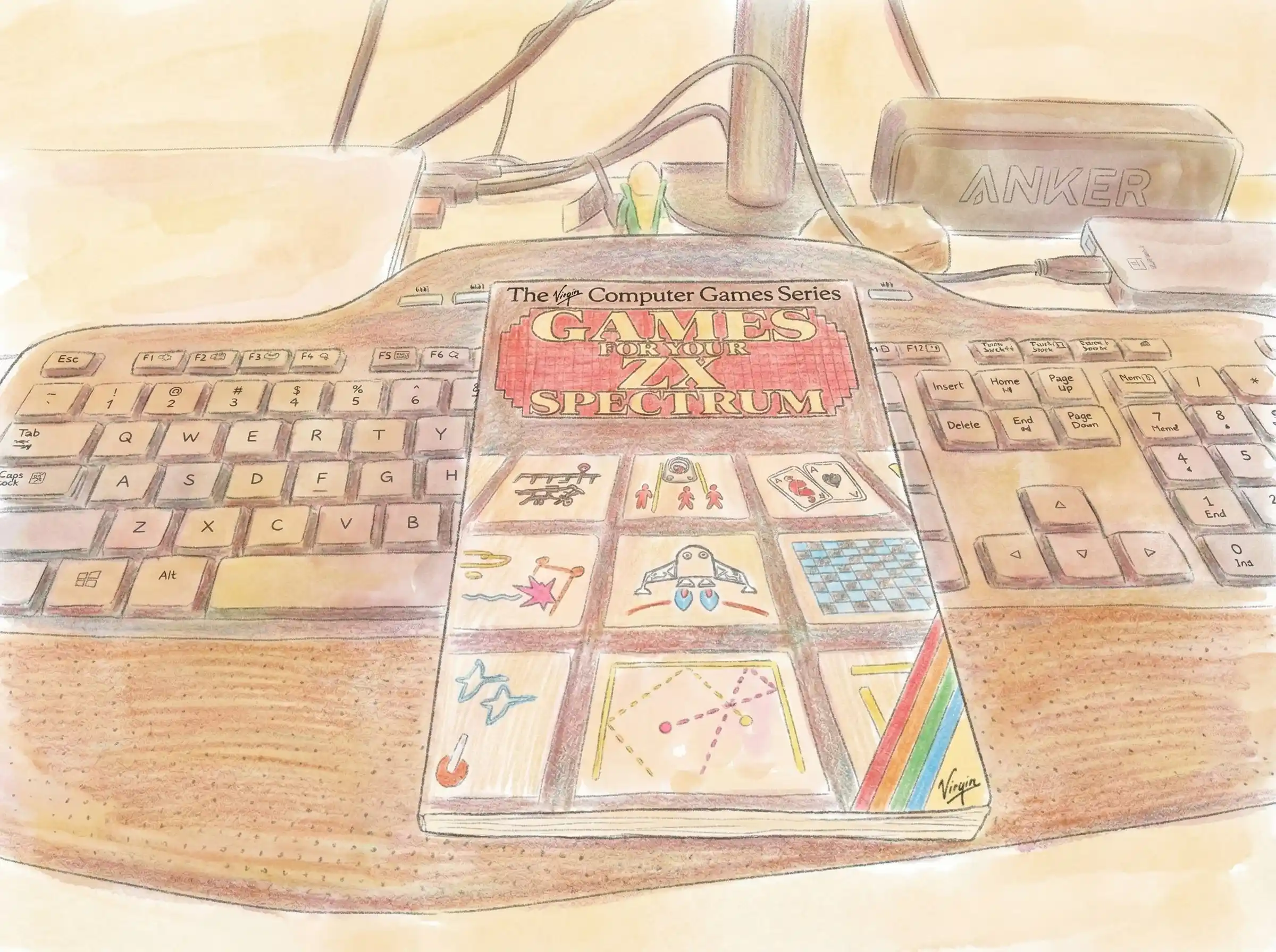 A Spectrum ZX Book rests on a desk between a computer keyboard and an Anker device under a monitor stand, offering a moment of nostalgia and reflection for my dad who passed away.
